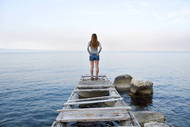 istock Lonely at the sea shore 976298878