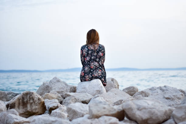 istock Lonely at the sea shore 976305352