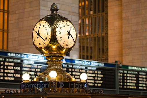 New York, USA - Jan 13, 2016: A clock and departure signs mid day at Grand Central Station.
