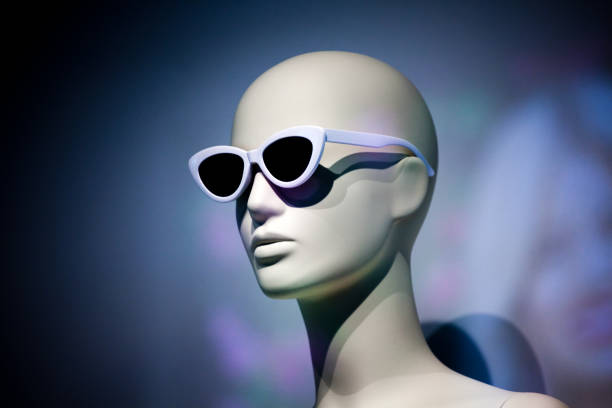 istock woman mannequin sunglasses podium 976329174