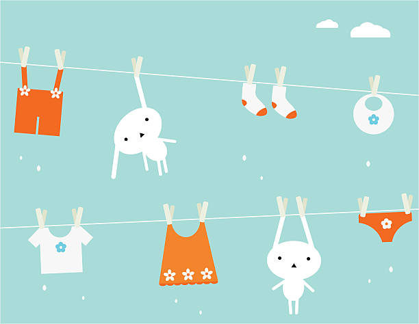Vector image of bunnies and clothes hanging on a line vector art illustration
