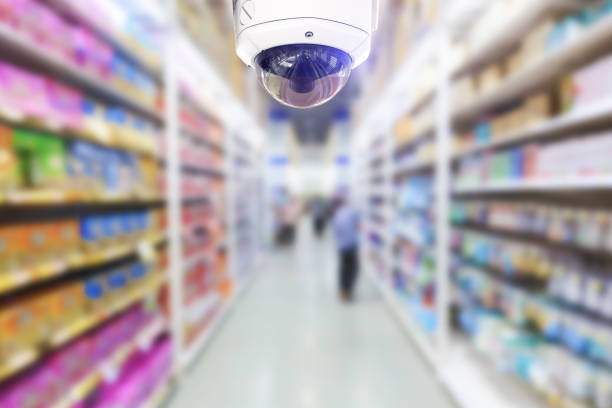 istock CCTV Security camera shopping department store on background. 976419018