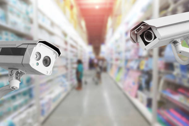 istock CCTV Security camera shopping department store on background. 976419114