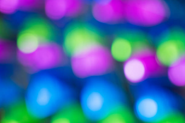 istock Colorful light bokeh background- abstract texture with highlights blurry. Circular Blurred bright light 976426978