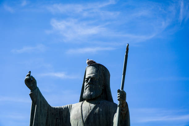 istock Greek statue against blue sky 976447040