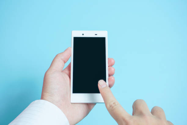 istock Using mobile phones in business scene. 976455036