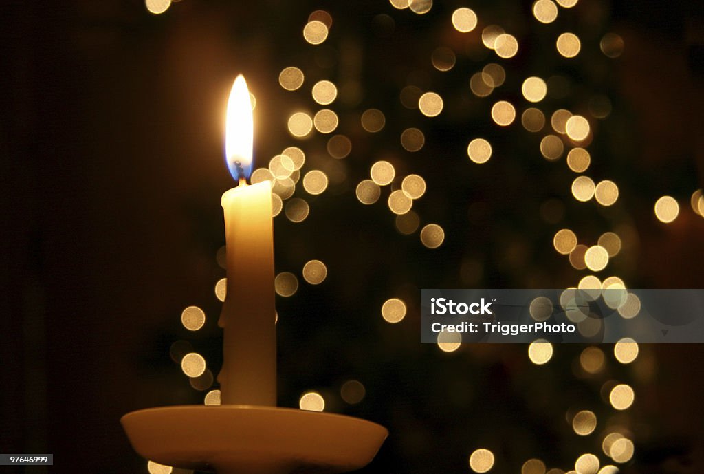 Candle light and a Christmas tree christmas candle. Candle Stock Photo