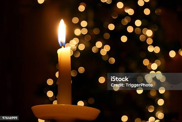 Candle Light And A Christmas Tree Stock Photo - Download Image Now - Candle, Candlelight, Christmas Decore Candle