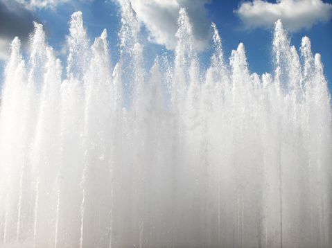large fountains reaching to sky.