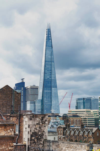 the shard, tallest building in uk, iconic architectural landmarks of london located on the southwark bank of the river thames seen from tower of london, england - tower london england greater london inner london imagens e fotografias de stock