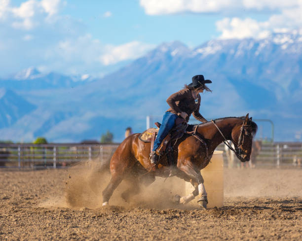 istock Cowgirl barrel racing rodeo 976480106