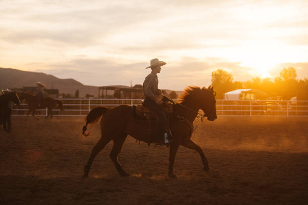 istock Cowboys at rodeo arena 976480326