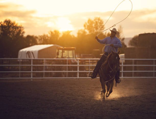 istock Cowboy practicing moves with lasso rope 976480350