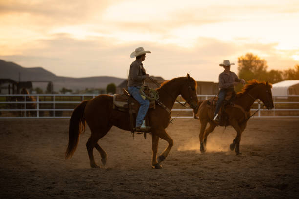 istock Cowboys at rodeo arena 976480368
