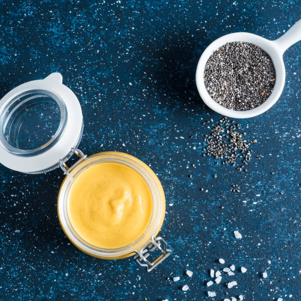 istock Vegan creamy cheddar cheese sauce with chia seeds 976495170
