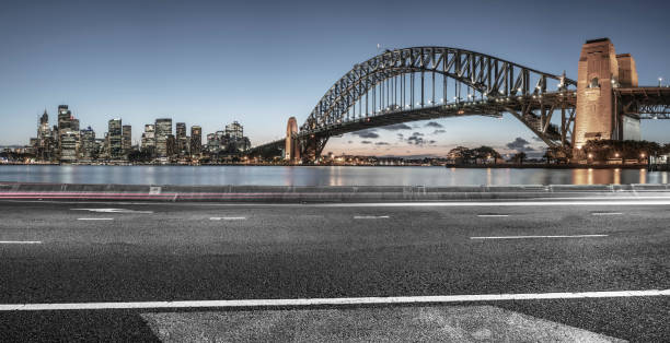 istock urban road by Sydney Harbor Bridge 976510410
