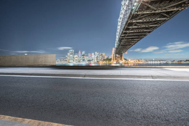 istock empty highway travel under Sydney Harbor Bridge,Australia 976510434