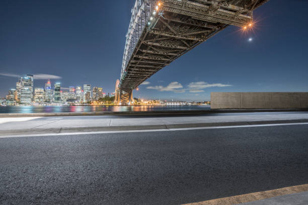 istock empty highway travel under Sydney Harbor Bridge,Australia 976510498