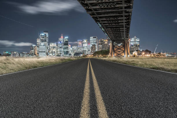 istock empty highway travel under Sydney Harbor Bridge,Australia 976512752