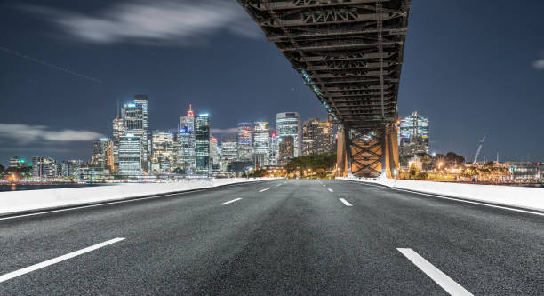 istock empty highway travel under Sydney Harbor Bridge,Australia 976512790