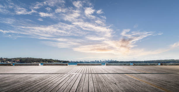 empty wooden plank front of sydney skyline