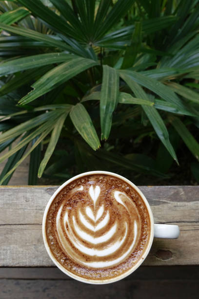 istock a cup of latte art coffee 976513172