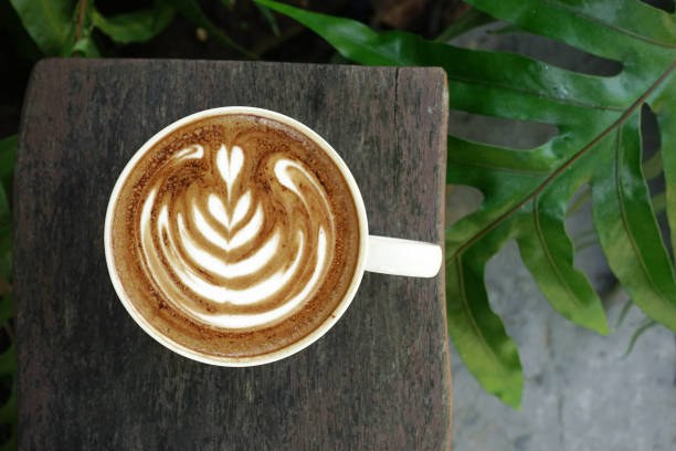 istock a cup of latte art coffee 976513174