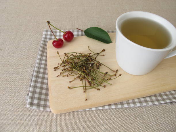чай из стеблей вишни - стебель стоковые фото и изображения