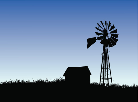 Layer-separated illustration of a farm house and windmill silhouette.