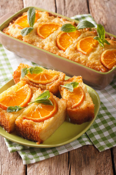 istock orange cake soaked in syrup on a plate close-up. vertical 976531684