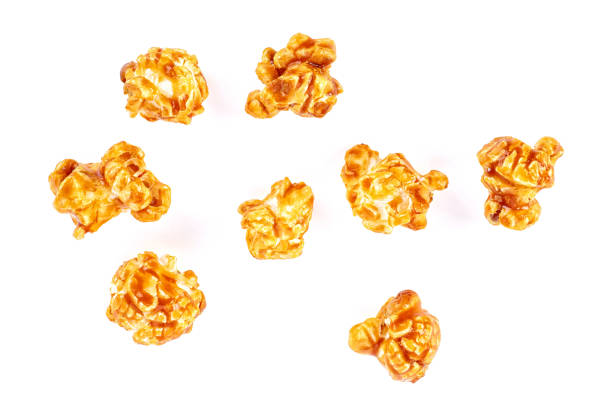 istock Caramel popcorn isolated on white background 976531708