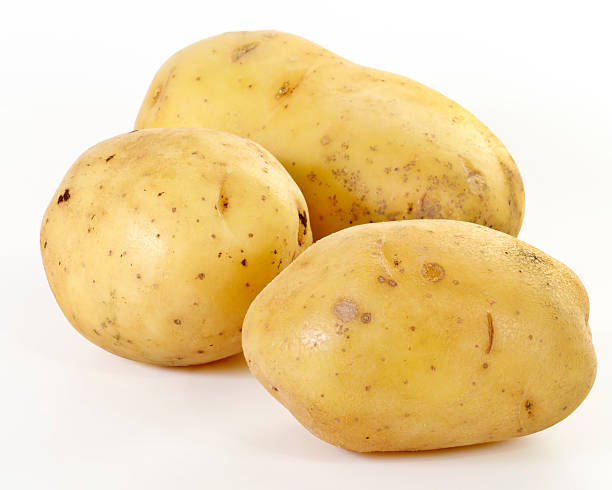 Three potatoes  gold potato stock pictures, royalty-free photos & images