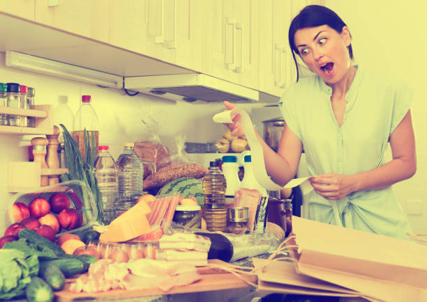 istock Upset woman checking food 976550668