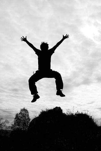 istock Silhouette of jumping man 97655229