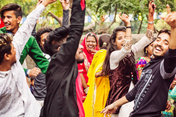 Udaipur, Rajasthan, India, February 6, 2018: Young Indians dancing at the wedding party