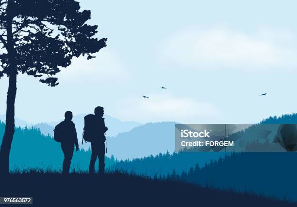 Two Tourists With Backpacks Standing In Mountain Landscape With Forest Under Blue Sky With Clouds And Flying Birds Vector Stock Illustration - Download Image Now