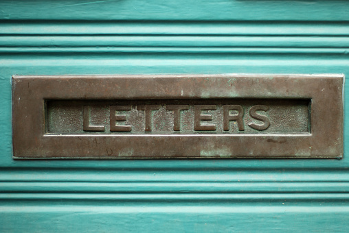 Mailbox, retro style, on country road. Rusty letterbox. Creative mailboxes in Australia. Rural road. Panoramic view.