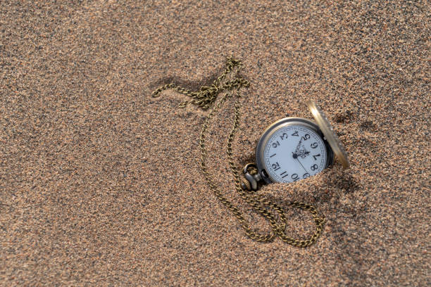istock Pocket watch on gobi desert 976566410