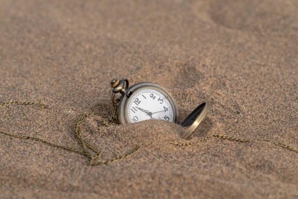 istock Pocket watch on gobi desert 976566588