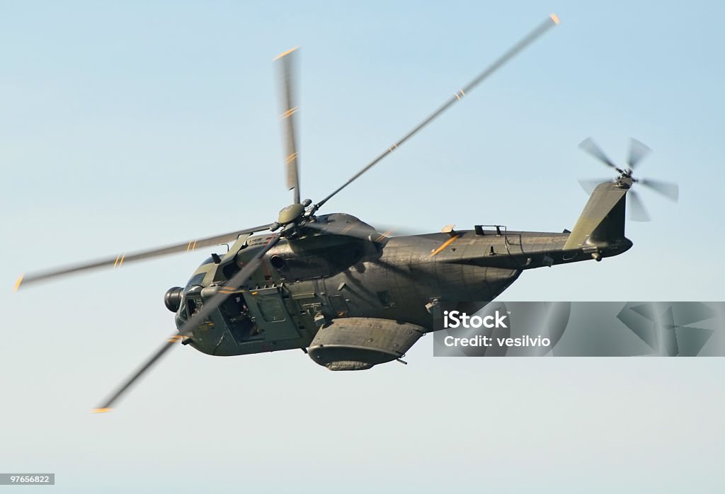 Hh-3F in mid flight. Italian Air Force HH-3F Italian Airforce rescue helicopter hovering during a sea rescue exhibition. Military Helicopter Stock Photo