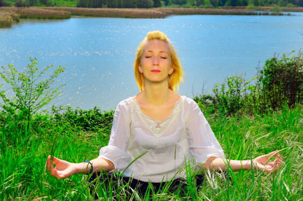 istock Young woman doing yoga 976568810