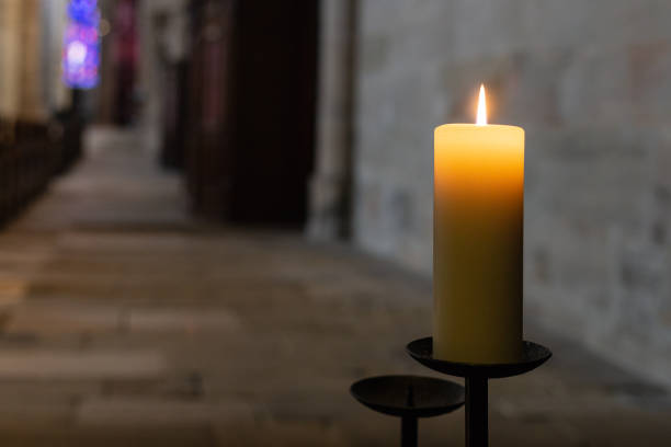 istock candlelight in church nave altar 976569782