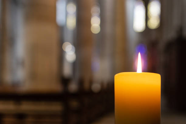candlelight in church nave altar in historical city south germany city of schwaebisch gmuend