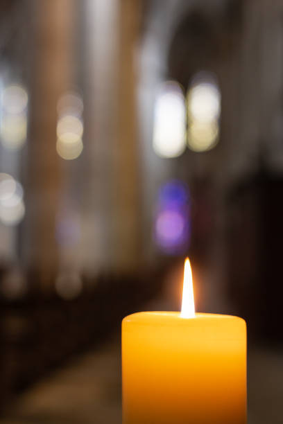 istock candlelight in church nave altar 976569786