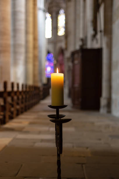 istock candlelight in church nave altar 976569794