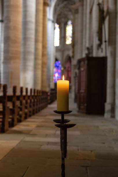 istock candlelight in church nave altar 976569812