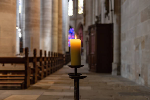 istock candlelight in church nave altar 976569828