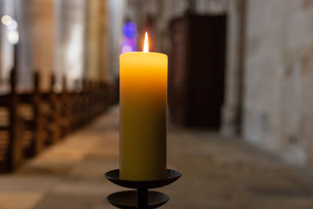istock candlelight in church nave altar 976569852
