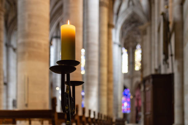 istock candlelight in church nave altar 976569854