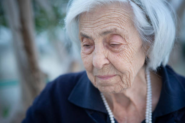 Memories of an elderly lady stock photo